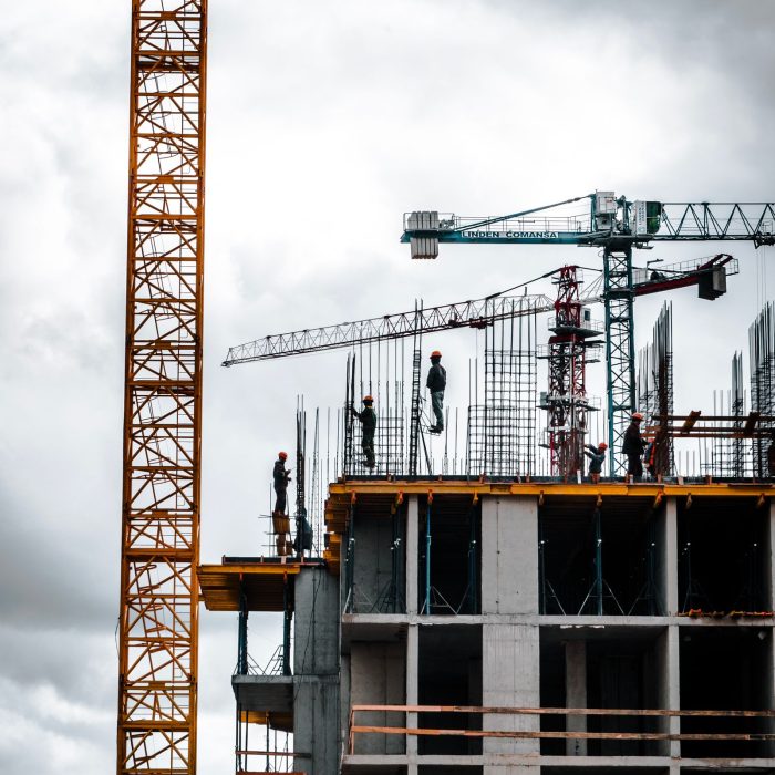 Building under construction with cranes