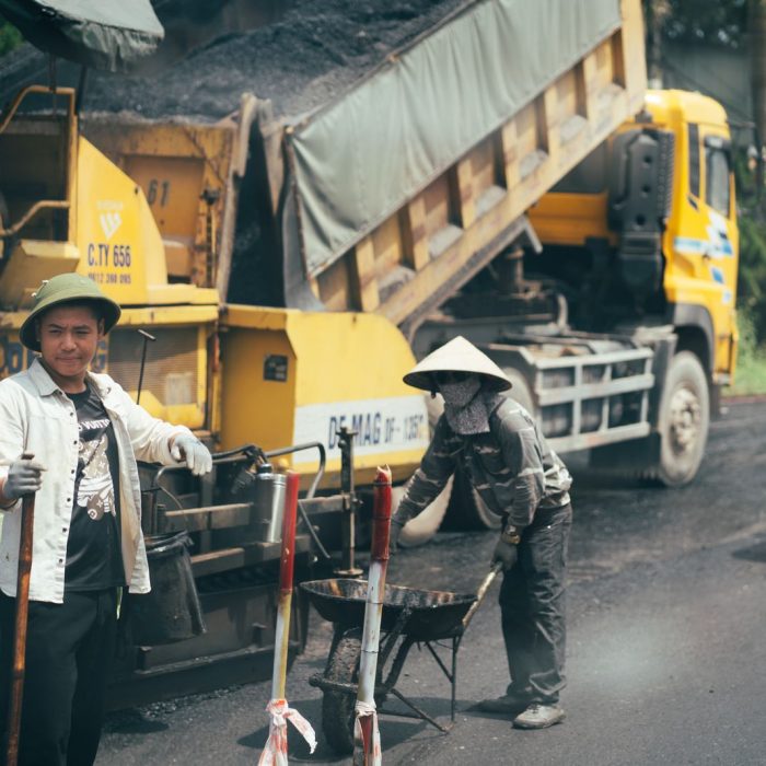 Dump trucks hauling materials