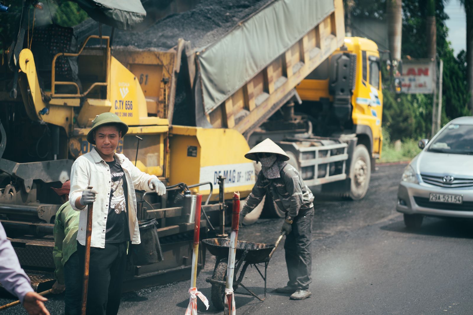 Dump trucks hauling materials